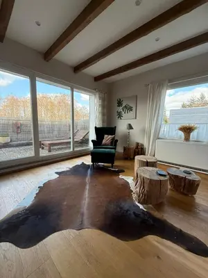 Ein Sitzbereich in der Unterkunft Ferienwohnung Sternstube De Luxe