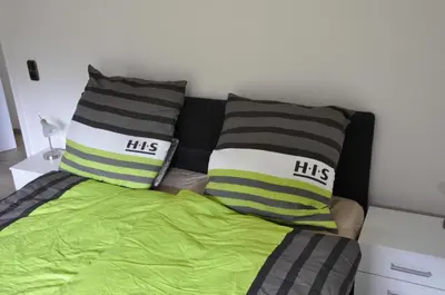 Ein Bett oder Betten in einem Zimmer der Unterkunft Ferienwohnung Fynns PeerLe