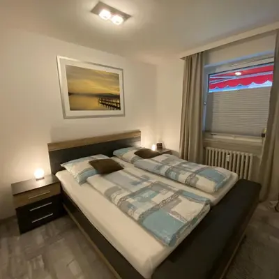 Ein Bett oder Betten in einem Zimmer der Unterkunft International 3