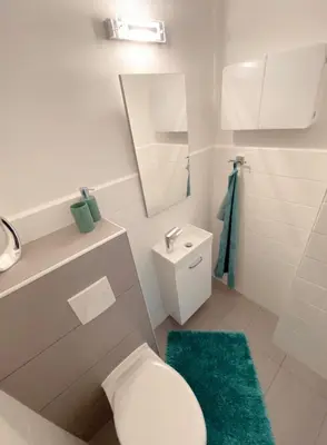Ein Badezimmer in der Unterkunft International 3