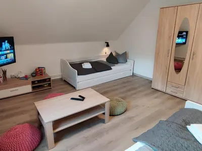 TV/Unterhaltungsangebot in der Unterkunft FaFeWo Ferienwohnungen mit Sternekomfort in Tanne Harz