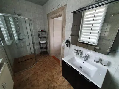 Ein Badezimmer in der Unterkunft FaFeWo Ferienwohnungen mit Sternekomfort in Tanne Harz