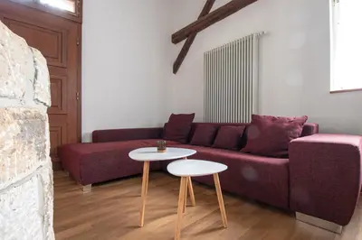 Ein Sitzbereich in der Unterkunft Ferienwohnung mit Brunnen