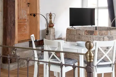 TV/Unterhaltungsangebot in der Unterkunft Ferienwohnung mit Brunnen