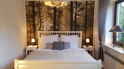 Ein Bett oder Betten in einem Zimmer der Unterkunft Ferienwohnung Am Casinopark