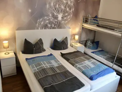 Ein Bett oder Betten in einem Zimmer der Unterkunft Familienspaß & Waldwege in Ilsenburg
