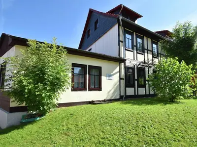Ein Garten an der Unterkunft Familienspaß & Waldwege in Ilsenburg