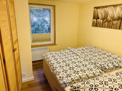 Ein Bett oder Betten in einem Zimmer der Unterkunft Retreat with Private Garden
