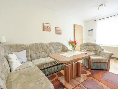 Ein Sitzbereich in der Unterkunft Gartenwohnung in Hasselfelde