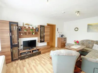 Ein Sitzbereich in der Unterkunft Gartenwohnung in Hasselfelde