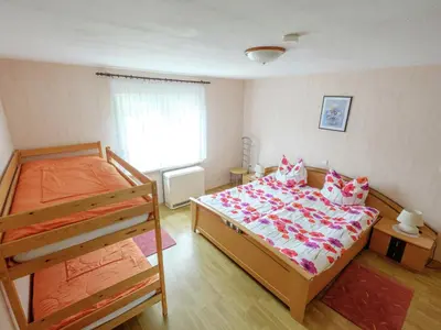 Ein Bett oder Betten in einem Zimmer der Unterkunft Gartenwohnung in Hasselfelde