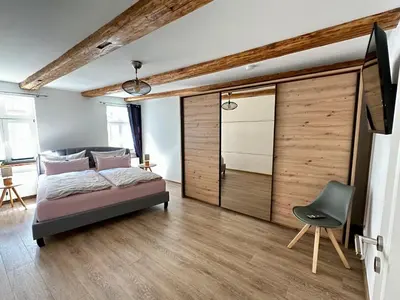 Ein Bett oder Betten in einem Zimmer der Unterkunft Mountain apart Ferienwohnungen im Harz
