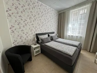 Ein Bett oder Betten in einem Zimmer der Unterkunft Apartment In der Hohen