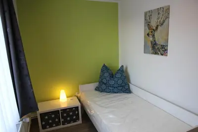 Ein Bett oder Betten in einem Zimmer der Unterkunft Wohnung Julius 5