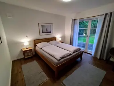 Ein Bett oder Betten in einem Zimmer der Unterkunft Ferienhaus Chalet Goldberg