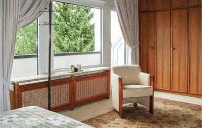 Ein Bett oder Betten in einem Zimmer der Unterkunft 3 Bedroom Beautiful Apartment In E-38644 Goslar