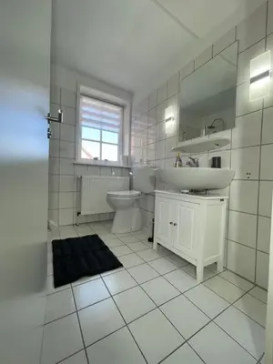 Ein Badezimmer in der Unterkunft Ferienwohnung Am Bündheimer Schloss