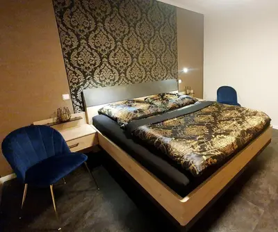 Ein Bett oder Betten in einem Zimmer der Unterkunft Ferienwohnung ODIN, FREYA & THOR