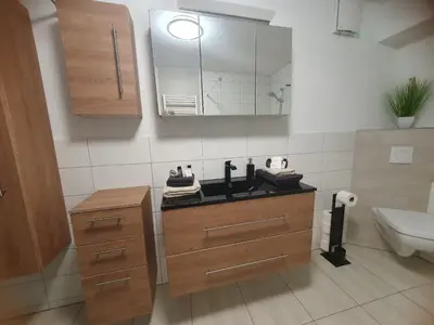 Ein Badezimmer in der Unterkunft Ferienwohnung ODIN, FREYA & THOR