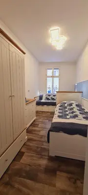 Ein Bett oder Betten in einem Zimmer der Unterkunft Ferienwohnung Nemo