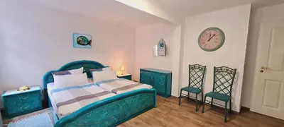 Ein Bett oder Betten in einem Zimmer der Unterkunft Ferienwohnung Nemo