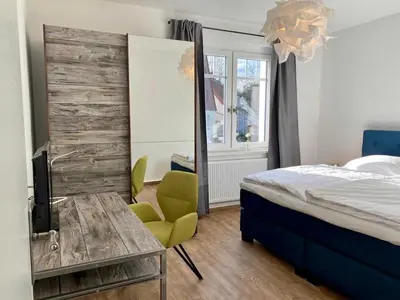 Ein Bett oder Betten in einem Zimmer der Unterkunft FeWoWa - FerienWohnungen Walter