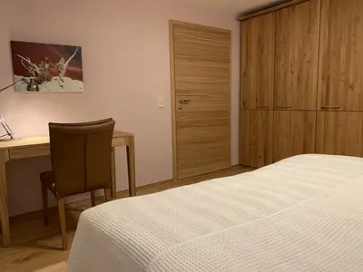 Ein Bett oder Betten in einem Zimmer der Unterkunft Bergmannstrost 5 Sterne Ferienwohnung