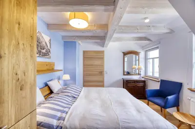 Ein Bett oder Betten in einem Zimmer der Unterkunft Morgenroethe 5 Sterne Ferienwohnung