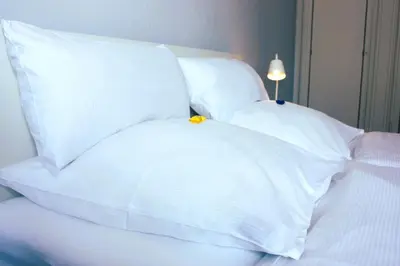Ein Bett oder Betten in einem Zimmer der Unterkunft Villa Brodthage, App. 3