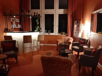 Ein Sitzbereich in der Unterkunft Hotel Villa Viktoria Luise