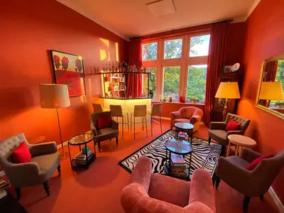 Ein Sitzbereich in der Unterkunft Hotel Villa Viktoria Luise