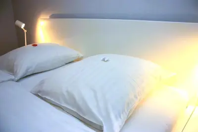 Ein Bett oder Betten in einem Zimmer der Unterkunft Villa Brodthage, App. 2