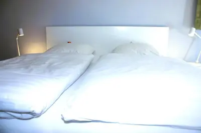 Ein Bett oder Betten in einem Zimmer der Unterkunft Villa Brodthage, App. 2