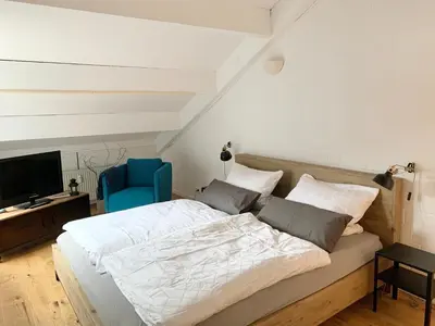 Ein Bett oder Betten in einem Zimmer der Unterkunft Ferienwohnung Mountainlook