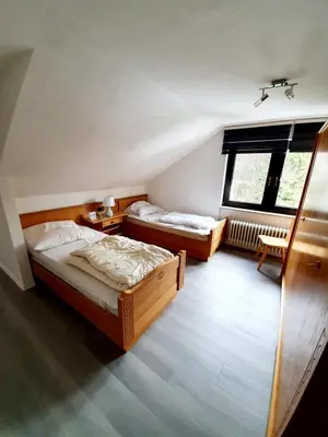 Ein Bett oder Betten in einem Zimmer der Unterkunft Landhaus Dahlem