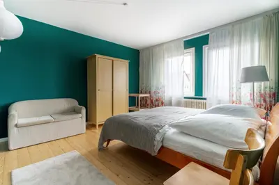 Ein Bett oder Betten in einem Zimmer der Unterkunft Familienfreundlich - Farbenfroh - Außergewöhnlich
