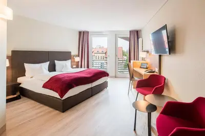 Ein Bett oder Betten in einem Zimmer der Unterkunft Best Western Hotel Schlossmühle Quedlinburg