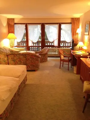 Ein Bett oder Betten in einem Zimmer der Unterkunft Hotel Sonnenhof