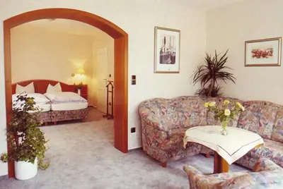 Ein Bett oder Betten in einem Zimmer der Unterkunft Hotel Sonnenhof