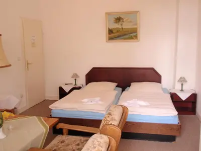 Ein Bett oder Betten in einem Zimmer der Unterkunft Hotel Richthofen