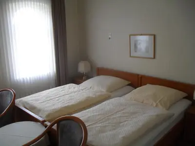 Ein Bett oder Betten in einem Zimmer der Unterkunft Hotel Richthofen