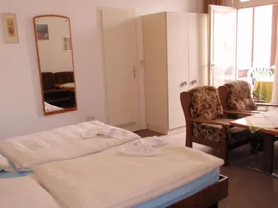 Ein Bett oder Betten in einem Zimmer der Unterkunft Hotel Richthofen