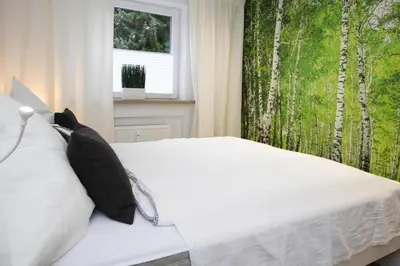 Ein Bett oder Betten in einem Zimmer der Unterkunft Ferienwohnung Hexenzauber I in Braunlage