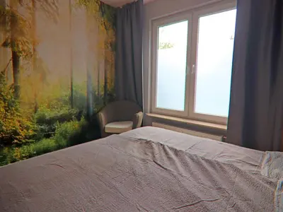 Ein Bett oder Betten in einem Zimmer der Unterkunft Ferienwohnung Hexenzauber I in Braunlage