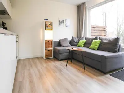 Ein Sitzbereich in der Unterkunft Apartment, Braunlage