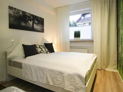 Ein Bett oder Betten in einem Zimmer der Unterkunft Apartment, Braunlage
