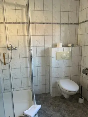 Ein Badezimmer in der Unterkunft Hotel Am Grudenberg