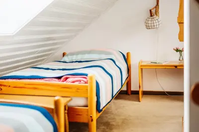 Ein Bett oder Betten in einem Zimmer der Unterkunft Große Wohnung - Boxspring - Rodelwiese - Balkon - 4 Personen