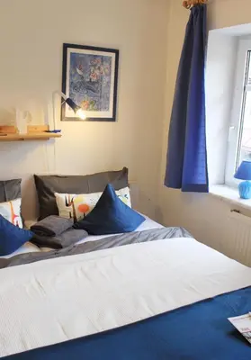 Ein Bett oder Betten in einem Zimmer der Unterkunft Harzer Roller 1+2