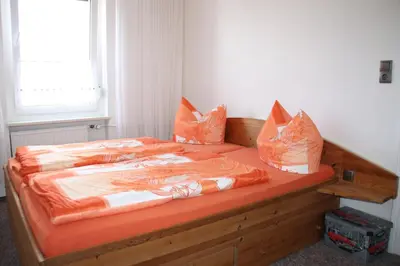Ein Bett oder Betten in einem Zimmer der Unterkunft Ferienwohnung Michalla